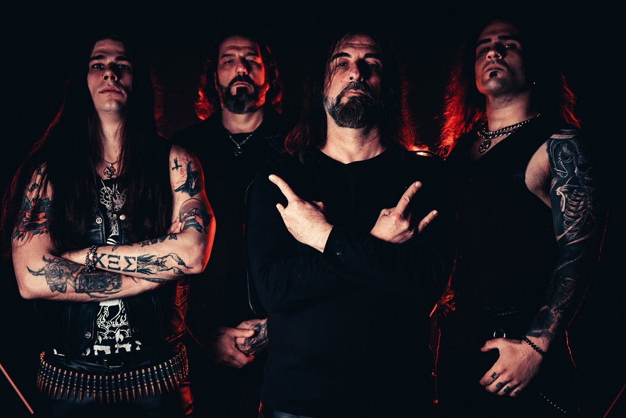 Non Serviam: The Story Of Rotting Christ - GEORGE EMMANUEL George Emmanuel  entered the ranks of Rotting Christ in 2012, initially as a live guitarist,  and has been playing with the band